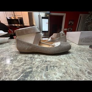 Brand new, never worn Jessica Simpson ballet flats, silver, gold. Size 9.5 women
